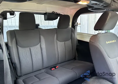 2014 Jeep Wrangler Sahara z USA, uszkodzony, nr VIN 1C4AJWBG7EL195101